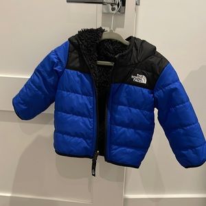 Baby 6-12 months black and blue north face puffy jacket with fleece inside